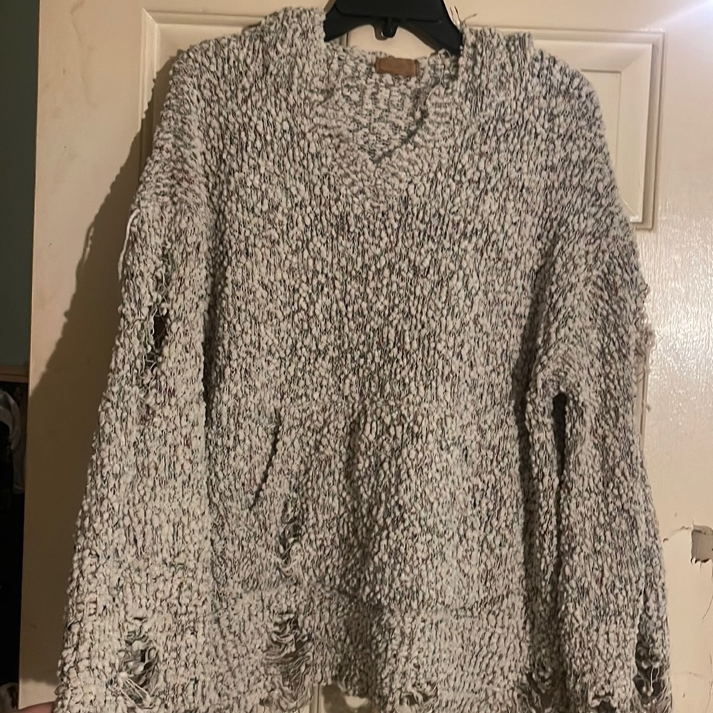 Distressed hoodie sweater
